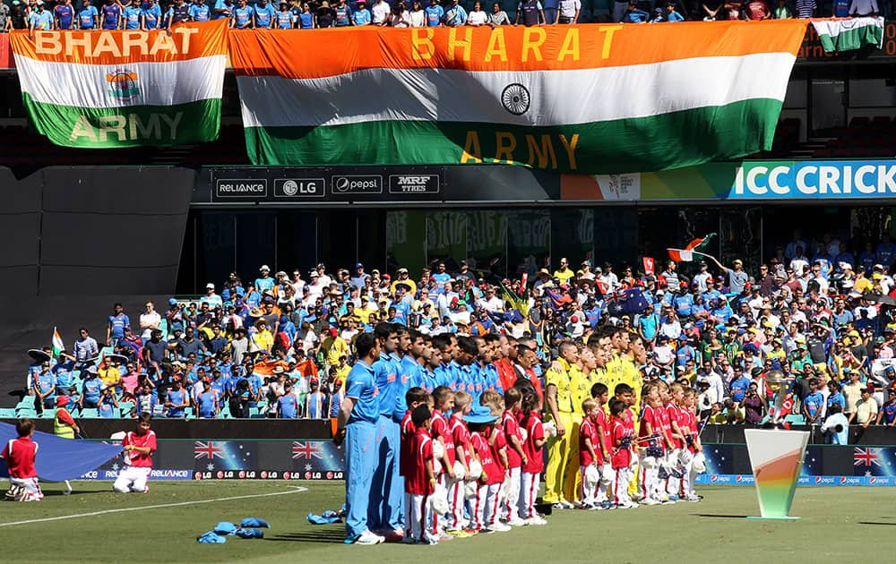 Indian and Australian teams line up for their national anthems ahead of their Cricket World Cup semifinal in Sydney, Australia.