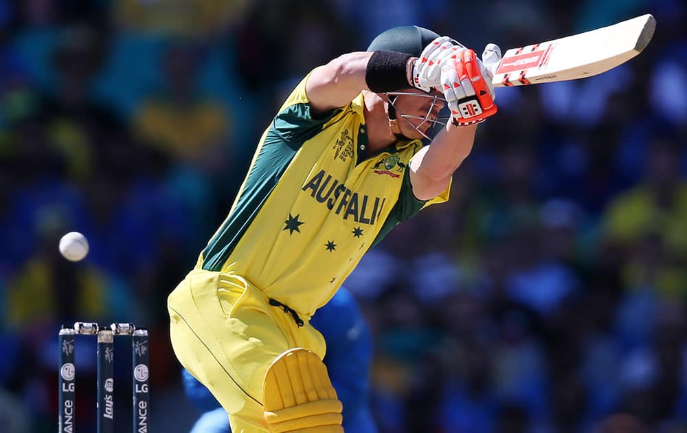 Australia's David Warner plays at the ball while batting against India during their Cricket World Cup semifinal in Sydney, Australia.