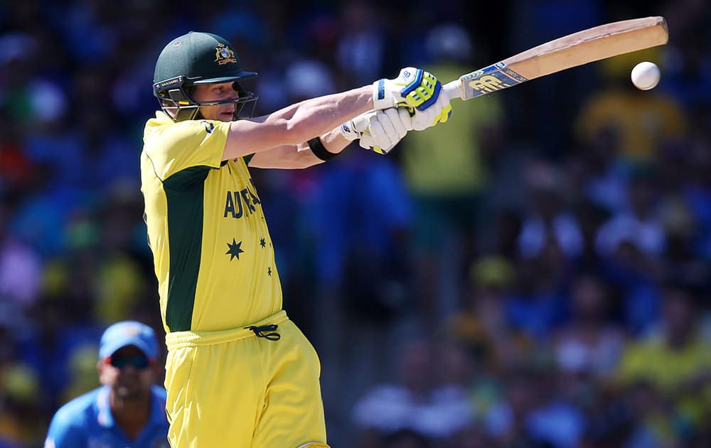 Steve Smith plays a pull shot while batting against India during their Cricket World Cup semifinal in Sydney.