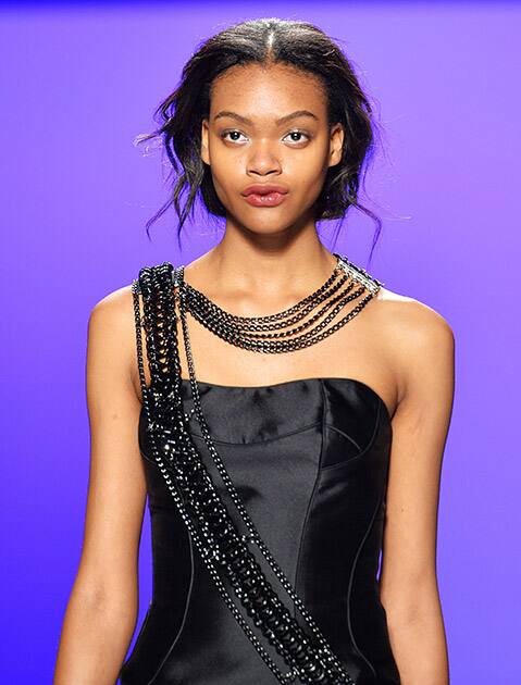 A model walks the runway for the David Dixon Fall 2015 collection during Toronto fashion week in Toronto.