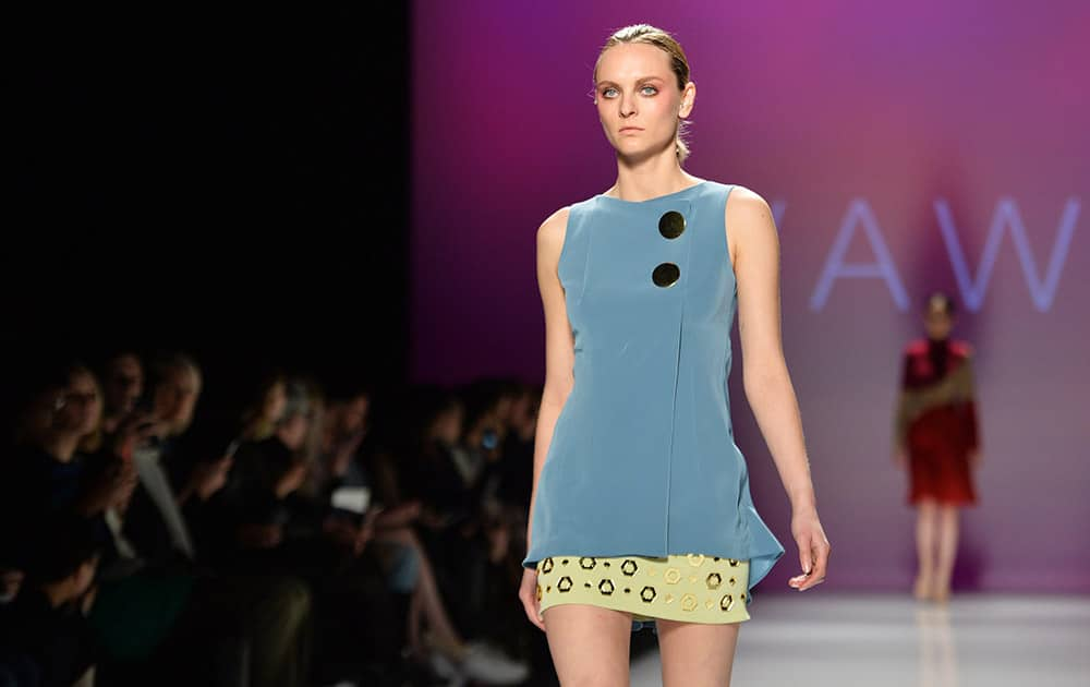 A model walks the runway for the VAWK Fall 2015 collection during Toronto fashion week in Toronto.