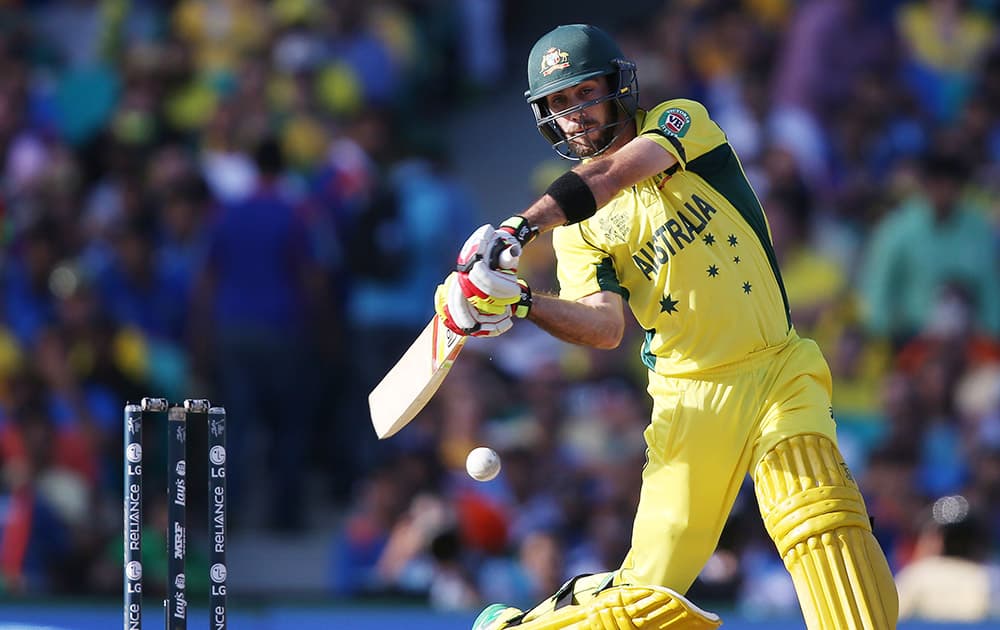 Australia's Glenn Maxwell hits the ball while batting against India during their Cricket World Cup semifinal in Sydney, Australia.