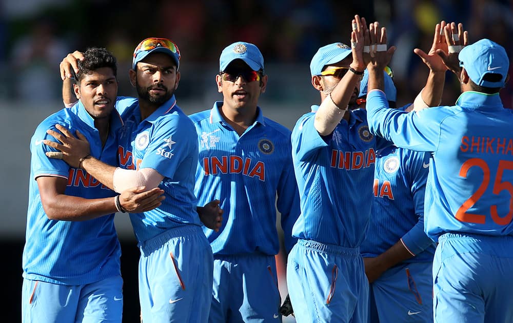 Players celebrate the dismissal of Australia's Aaron Finch during their Cricket World Cup semifinal in Sydney.