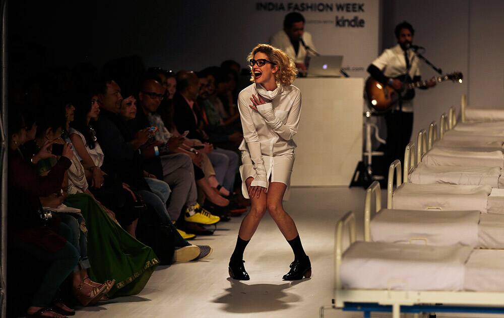 An Indian model displays creations by Rajesh Pratap Singh during the Amazon India Fashion Week in New Delhi.