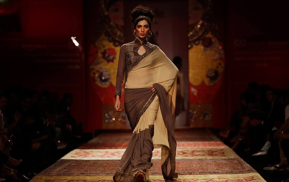 A model displays a creation by JJ Valaya during the Amazon India Fashion Week in New Delhi.