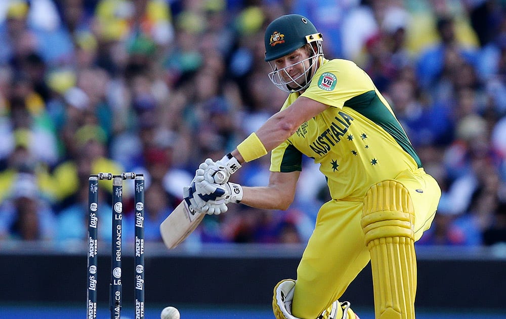 Australia's Shane Watson hits the ball while batting against India during their Cricket World Cup semifinal in Sydney, Australia.