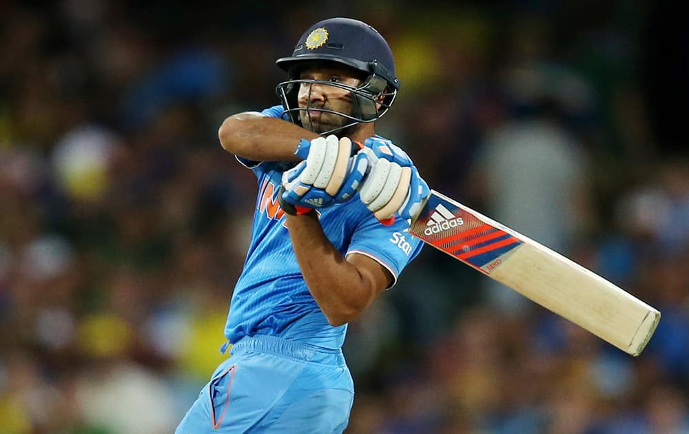 Rohit Sharma plays a shot while batting against Australia during their Cricket World Cup semifinal in Sydney, Australia.