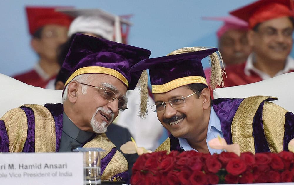 Vice President Mohd. Hamid Ansari with Delhi Chief Minister Arvind Kejriwal during the convocation of Guru Gobind Singh Indraprastha University, in New Delhi.