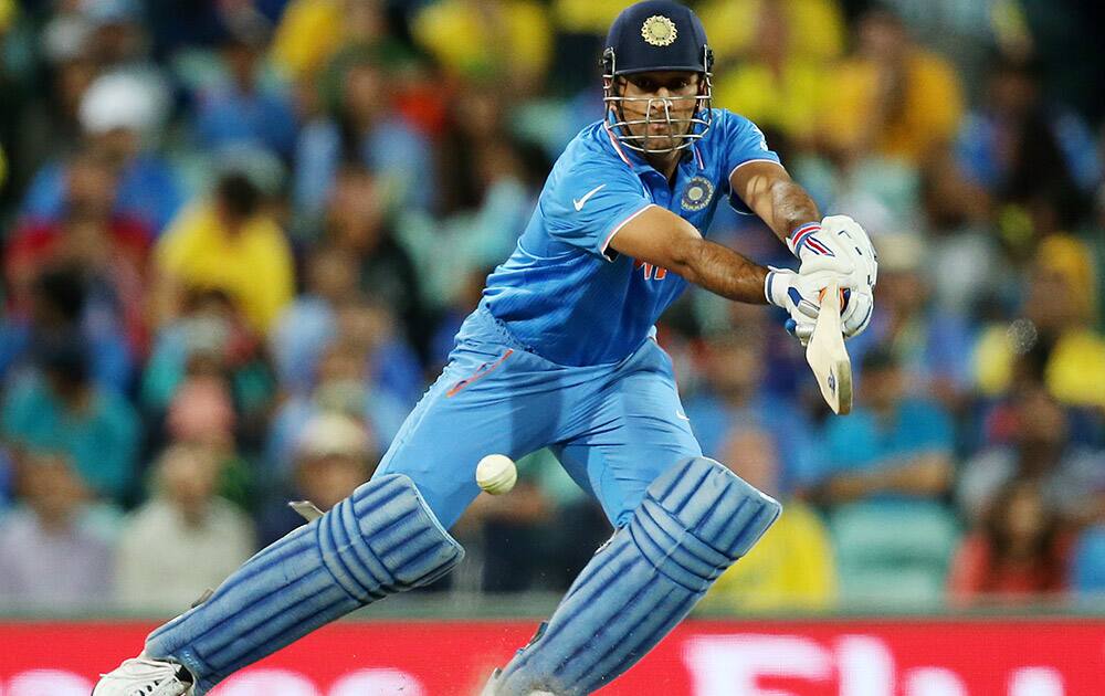 MS Dhoni plays a shot while batting against Australia during their Cricket World Cup semifinal in Sydney, Australia.