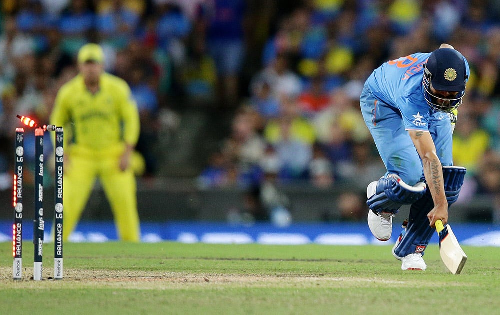 Ravindra Jadeja is run out for 16 runs while batting against Australia during their Cricket World Cup semifinal in Sydney, Australia.