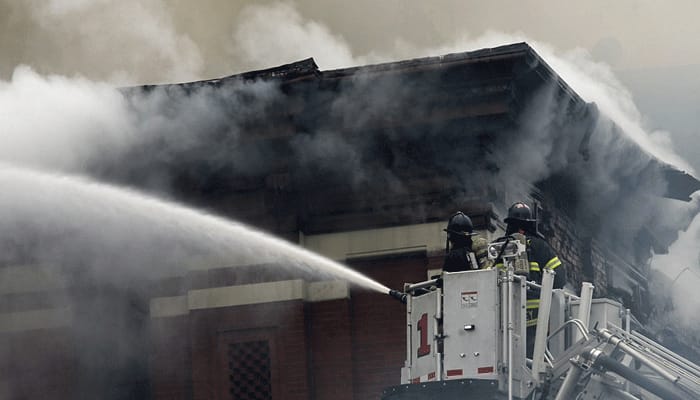 Nineteen hurt as blast, then fire bring down New York buildings