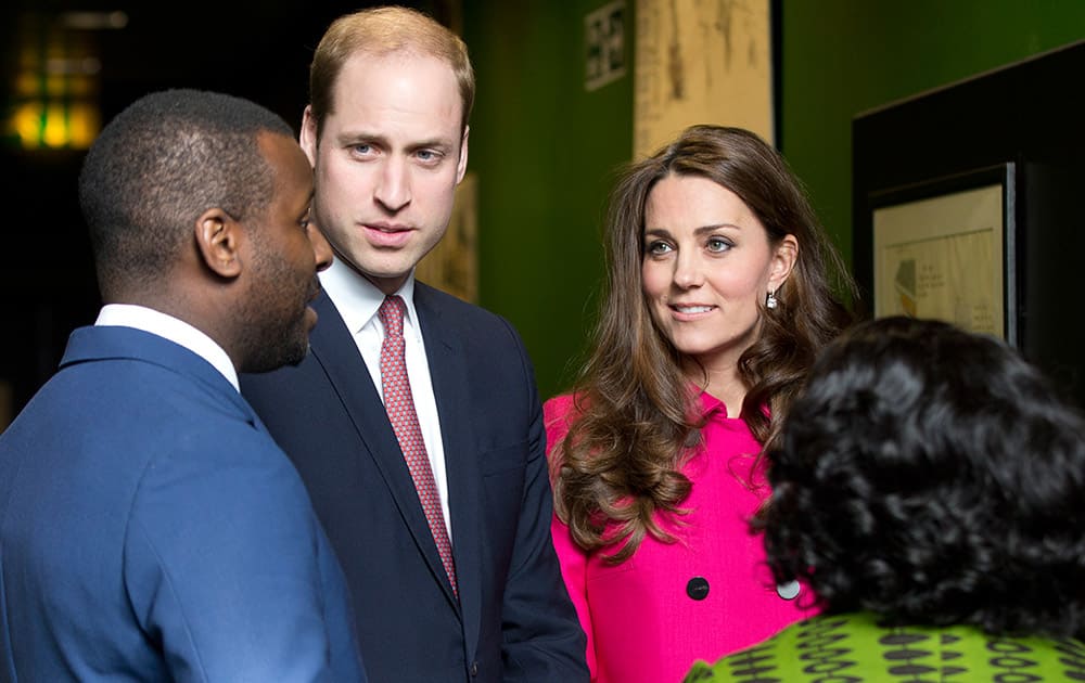 Britain's Prince William and Kate Duchess of Cambridge speak with Stephen Lawrence's brother Stuart and his mother Baroness Doreen Lawrence at the Stephen Lawrence Centre London. Stephen Lawrence was stabbed to death by a group of white youths in April 1993, he was 19 years old and waiting for a bus, the centre is built in his memory.