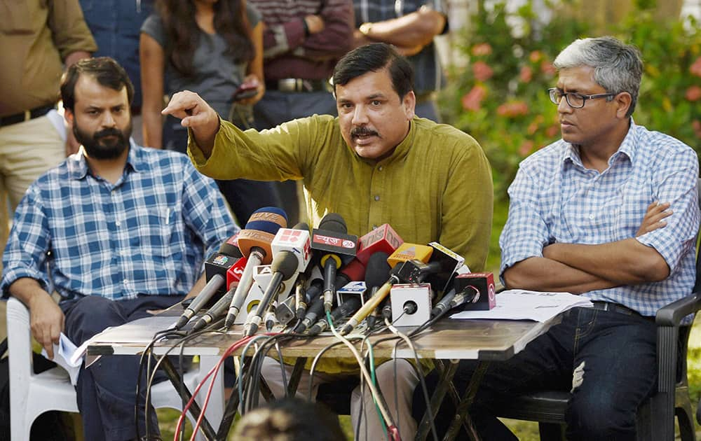 AAP leaders Sanjay Singh, Ashish Khetan and Ashutosh during a press conference in New Delhi.