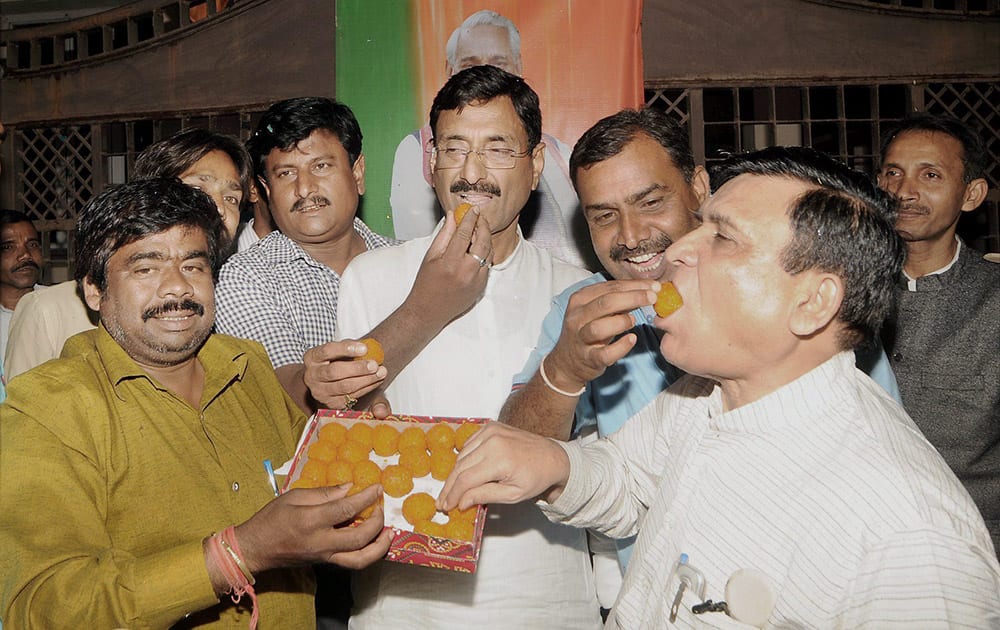 BJP workers celebrate after former Prime Minister Atal Bihari Vajpayee was conferred with Bharat Ratna, in Ranchi.