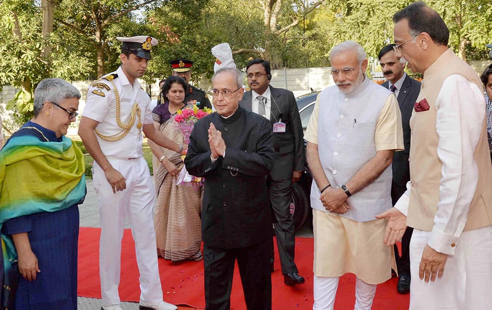President Pranab Mukherjee arrives to confer the Bharat Ratna on former Prime Minister Atal Bihari Vajpayee at his residence in New Delhi.