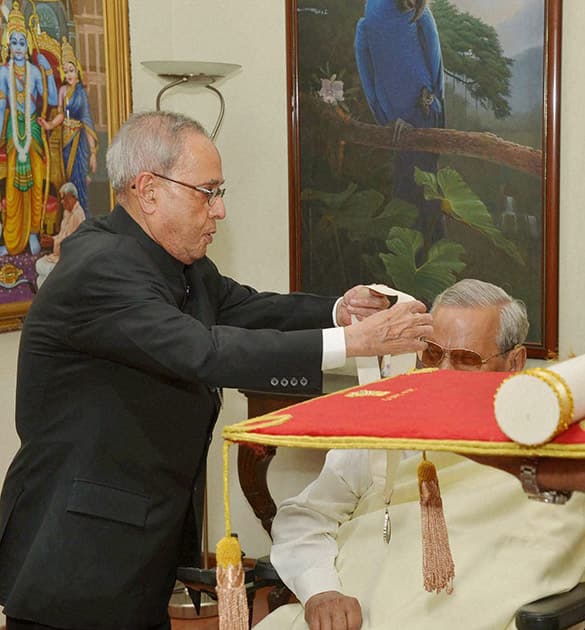 President Pranab Mukherjee conferring the Bharat Ratna on former Prime Minister Atal Bihari Vajpayee at his residence in New Delhi.