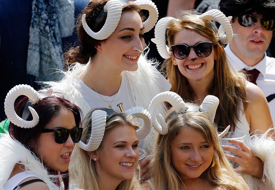 Rugby fans wear sheep horn headbands during a second day match of the Hong Kong Sevens rugby tournament in Hong Kong.