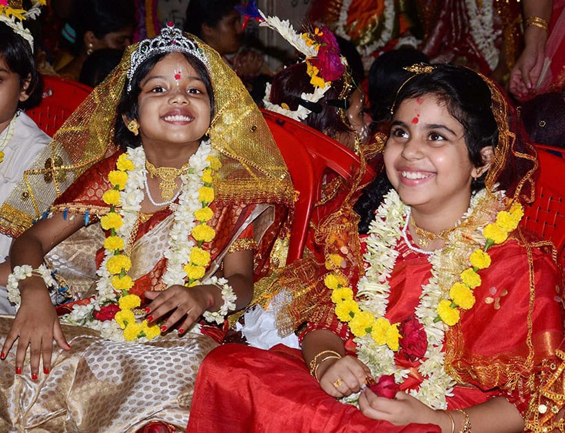 Girls being worshipped during Kumari Puja at Dakhineswar Ramakrishna Aadahyapitih on the occasion of Ram Navami festival in Kolkata.