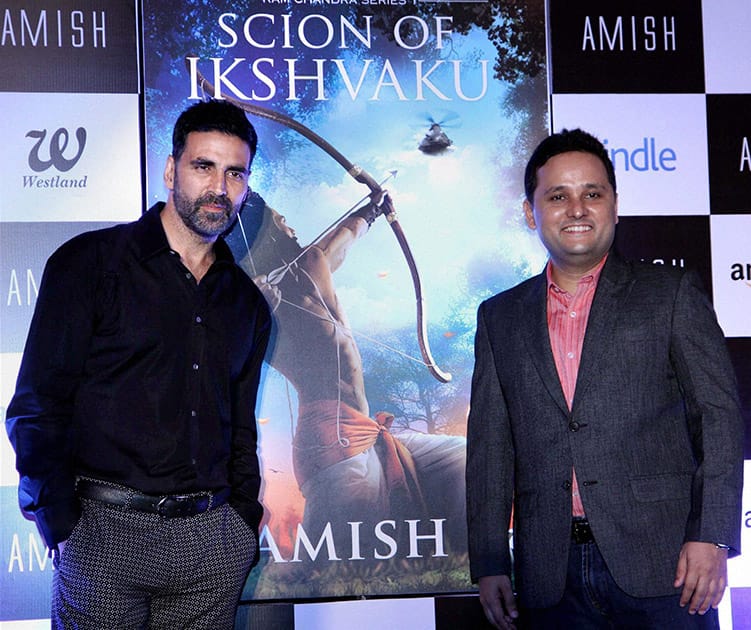 Bollywood actor Akshay Kumar with author Amish Tripathi during the unveiling of the latters book Scion of Ikshkavu in Mumbai.