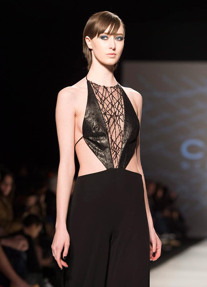 A model walks the runway in the Stephan Caras show during Toronto fashion week in Toronto.