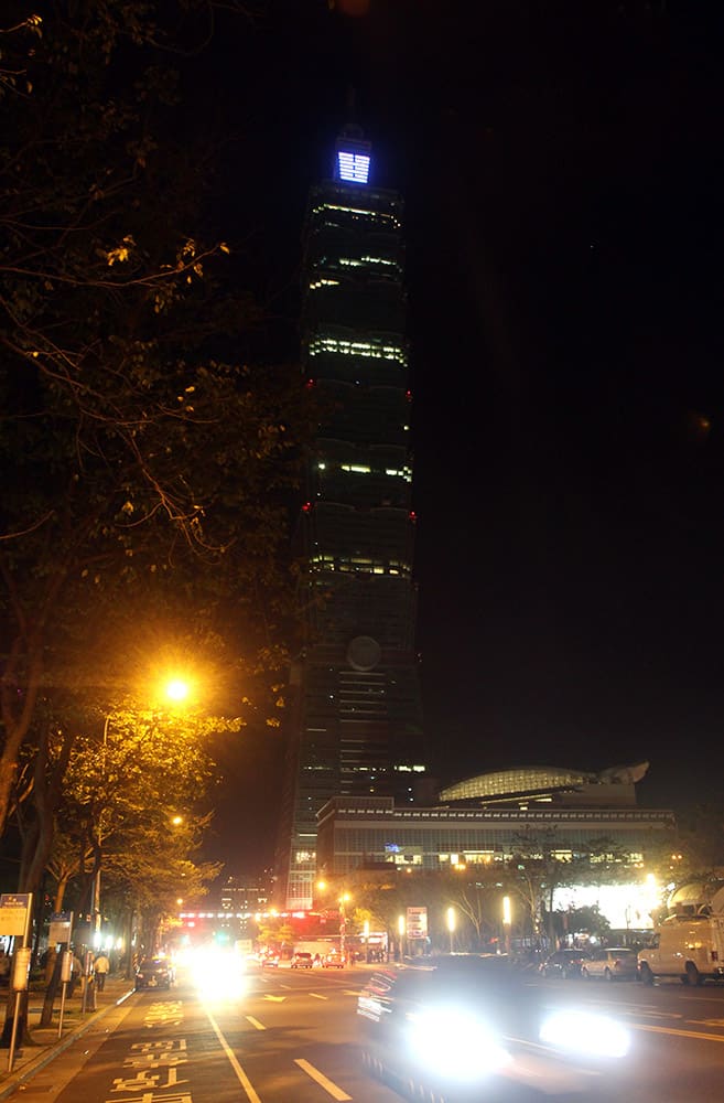 The Taipei 101 Building is seen darkened during the Earth Hour in Taipei, Taiwan. Organised by the World Wide Fund for Nature, Earth Hour is observed every year to create awareness about conservation of energy and climate change. Around the world, people and organisations will be turning their lights off from 8:30 to 9:30 pm local time.