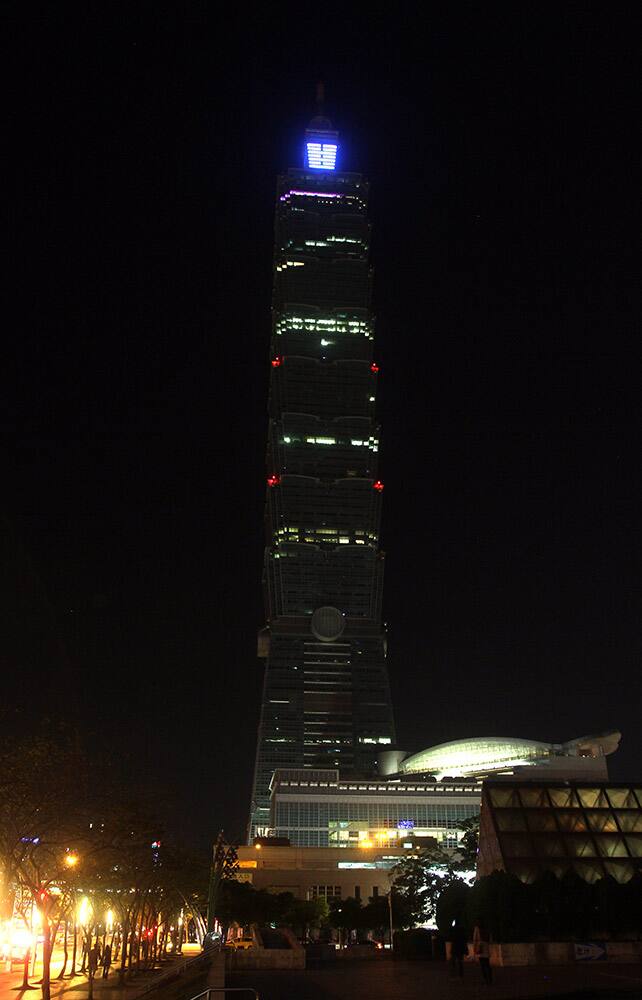 The Taipei 101 Building is seen darkened during the Earth Hour in Taipei, Taiwan. Organised by the World Wide Fund for Nature, Earth Hour is observed every year to create awareness about conservation of energy and climate change. Around the world, people and organisations will be turning their lights off from 8:30 to 9:30 pm local time.