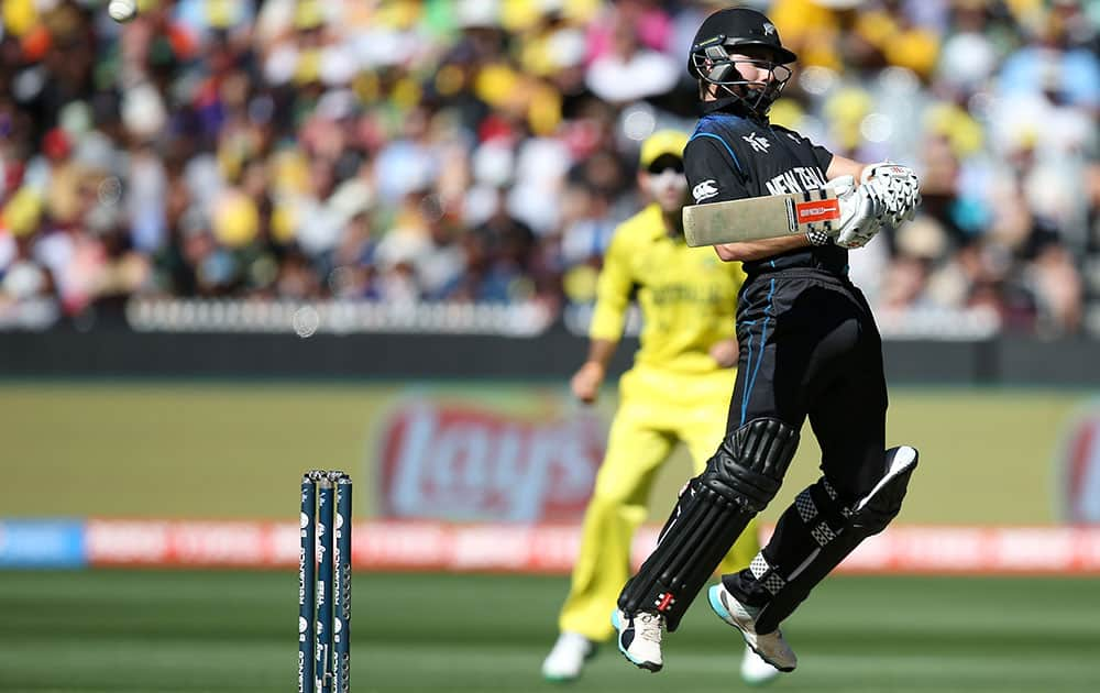 New Zealand’s Kane Williamson avoids a bouncer while batting against Australia during the Cricket World Cup final in Melbourne, Australia.