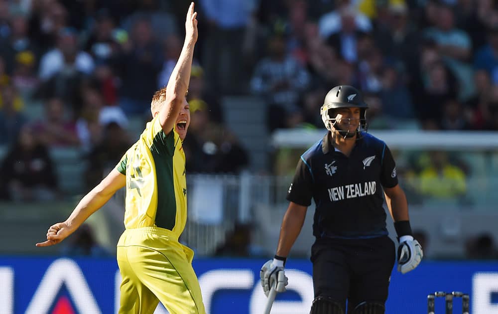 Australia's James Faulkner, appeals successfully for the wicket of New Zealand’s Ross Taylor, right, during the Cricket World Cup final in Melbourne, Australia.