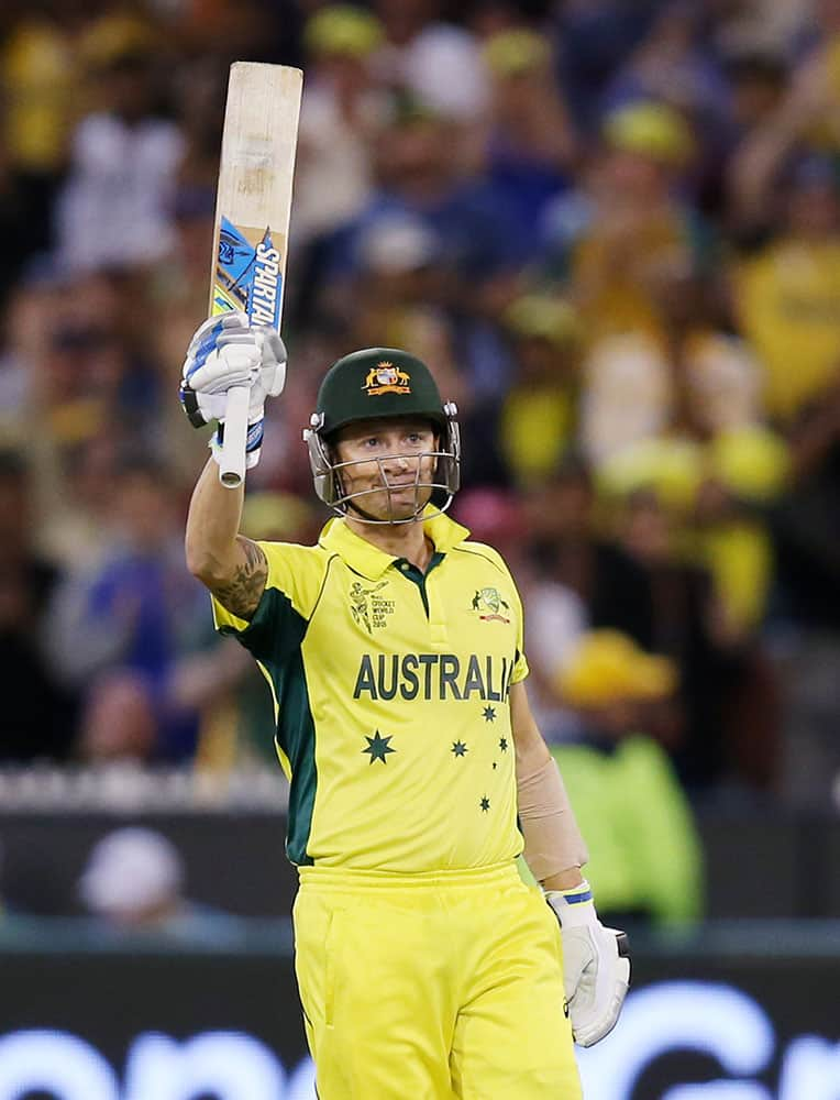 Australian captain Michael Clarke waves his bat after scoring 50 runs while batting against New Zealand during the Cricket World Cup final in Melbourne, Australia.