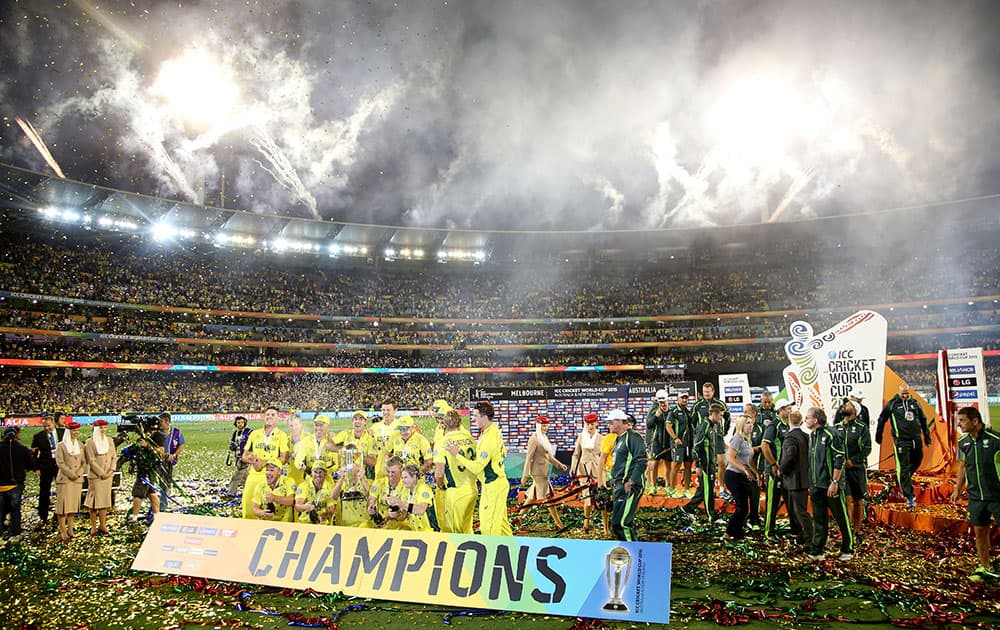 Fireworks explode around the Melbourne Cricket Ground as the Australian team celebrate their seven wicket win over New Zealand in the Cricket World Cup final in Melbourne, Australia.