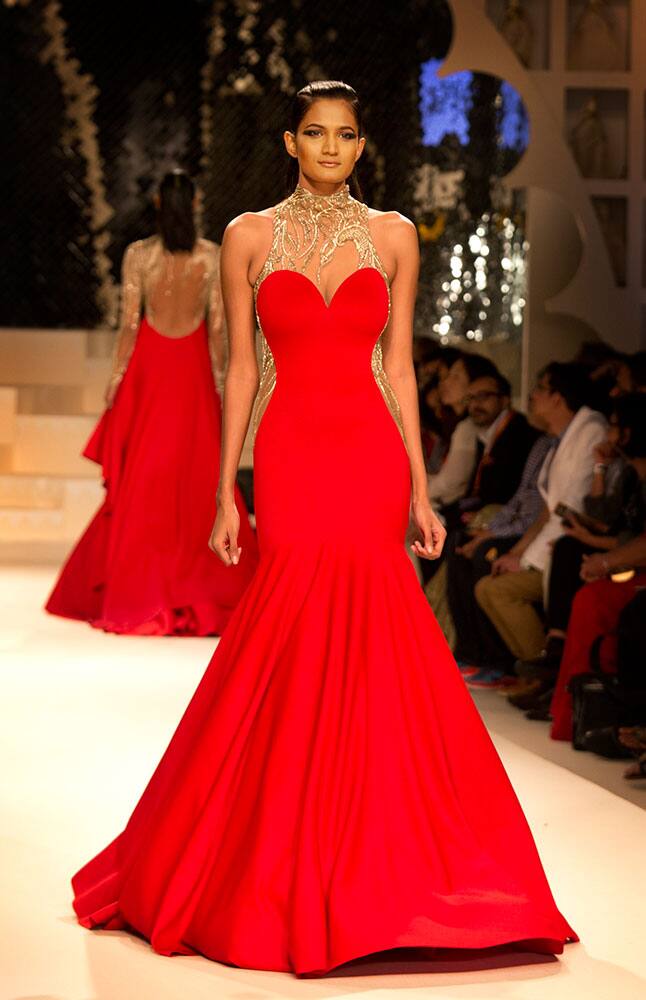 A model displays creation of Indian designer Gaurav Gupta during the grand finale of Amazon India fashion Week.