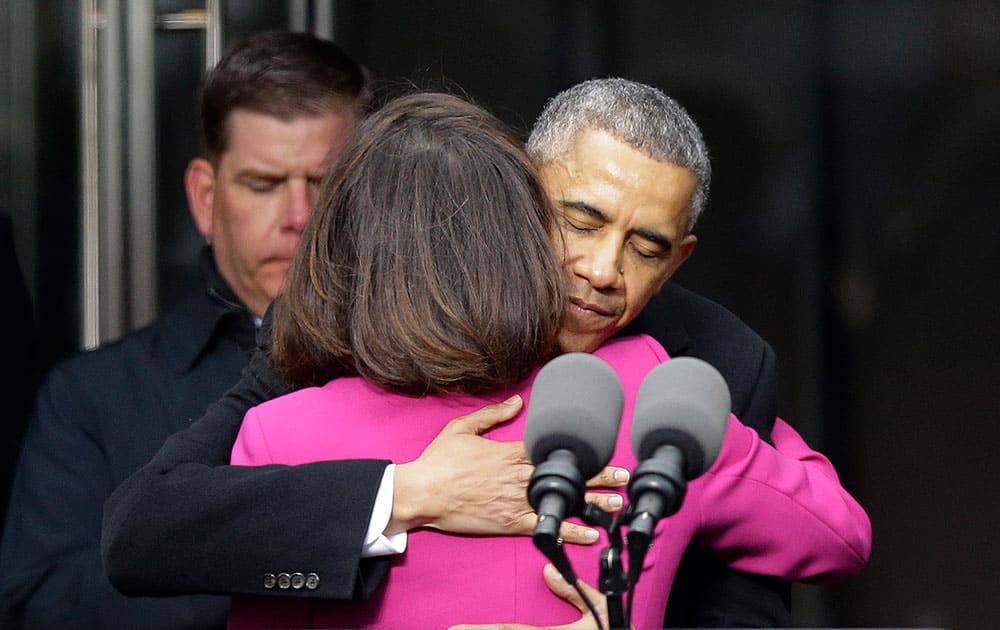 President Barack Obama hugs Victoria Reggie Kennedy, former Sen. Ted Kennedy’s widow, during the dedication of the Edward M. Kennedy Institute for the United States Senate, in Boston.