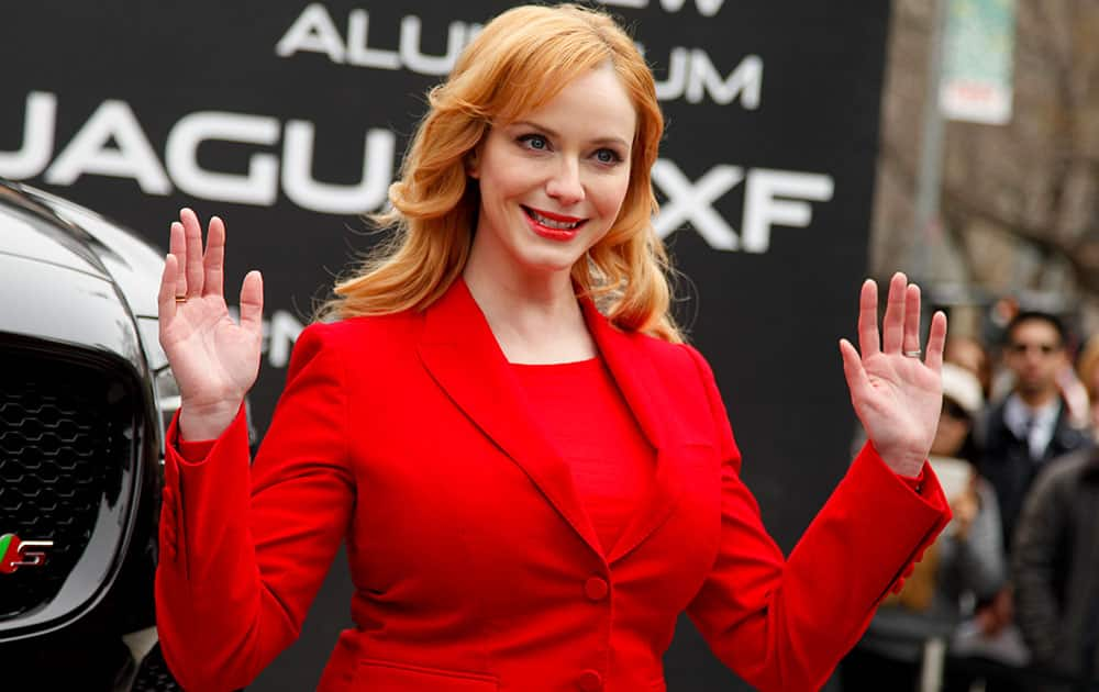 Actress Christina Hendricks helps to unveil the new Jaguar 2016 XF Sedan at Flatiron Square in New York.