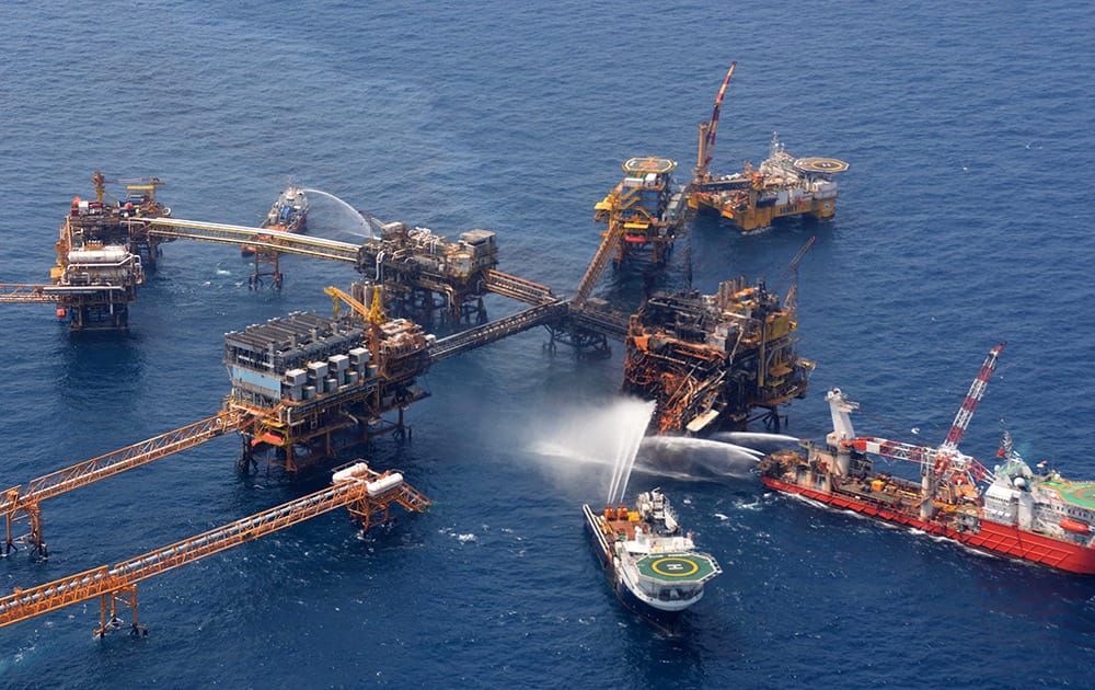 This photo provided by Petroleos Mexicanos (Pemex), emergency boats works to put out a fire at the Abkatun-A Permanente shallow-water oil platform in the Campeche Sound.