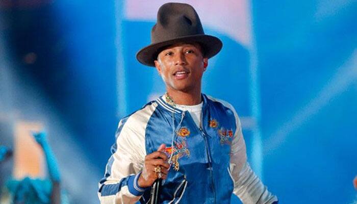 Pharrell Williams waxwork unveiled at Madame Tussauds