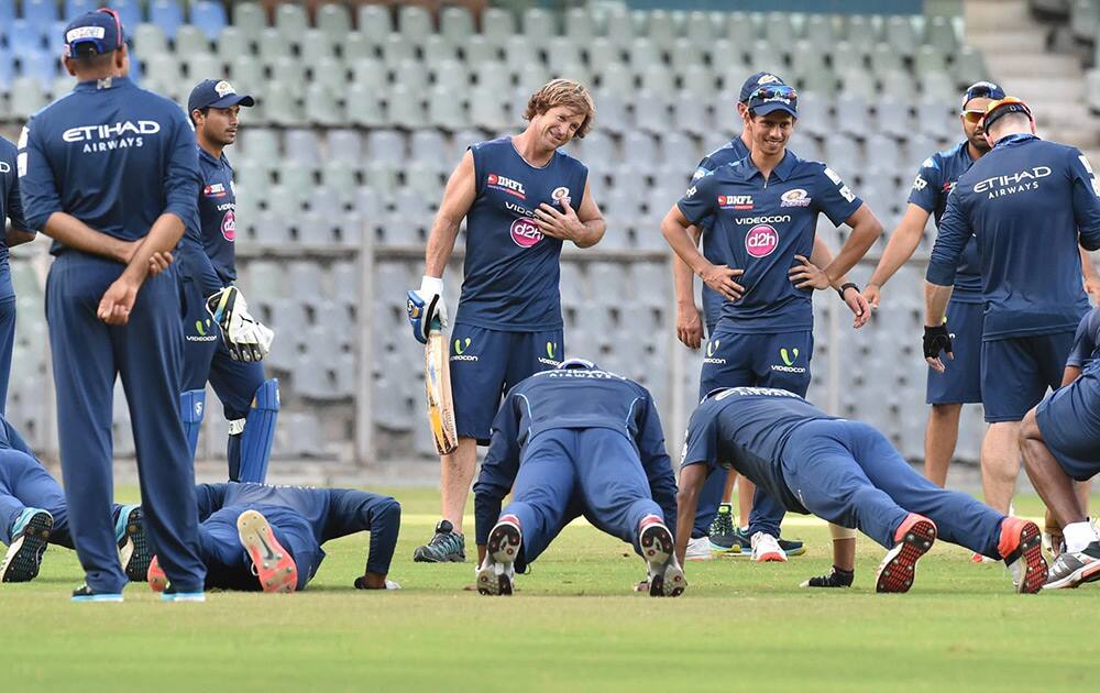 Mumbai Indians fielding coach Jonty Rhodes alongwith players during a practice session in Mumbai.