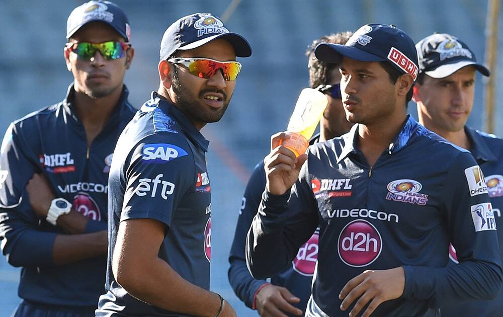 Mumbai Indians Rohit Sharma with players during a practice session in Mumbai.