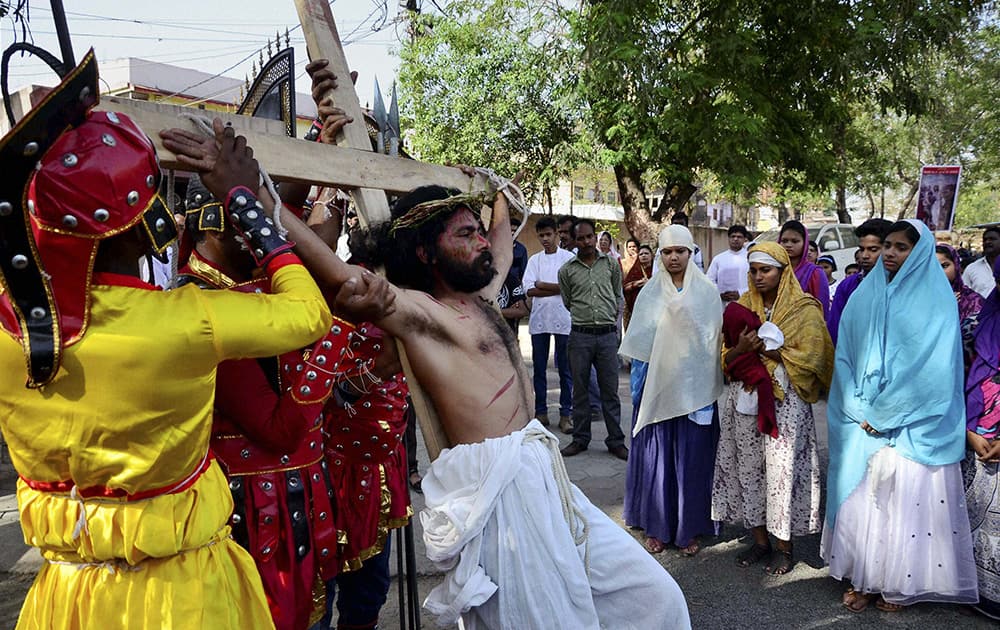 Christians at a Good Friday procession at St. Francis Church in Bhopal.