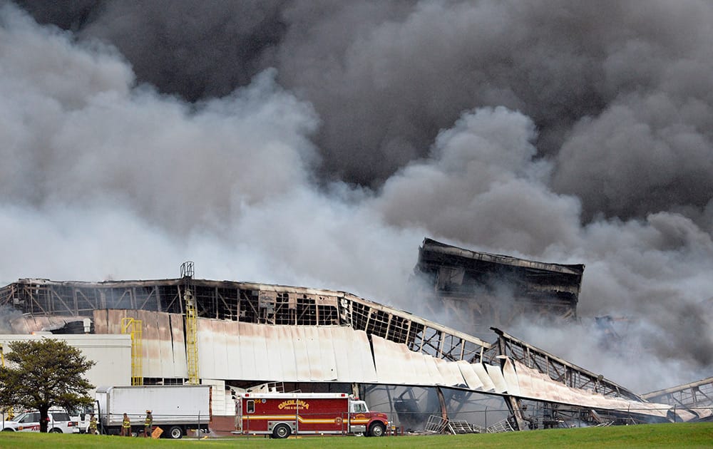 More than 120 Louisville Firefighters continue to battle the blaze in building six at the General Electric Appliance Park complex in Louisville, Ky.