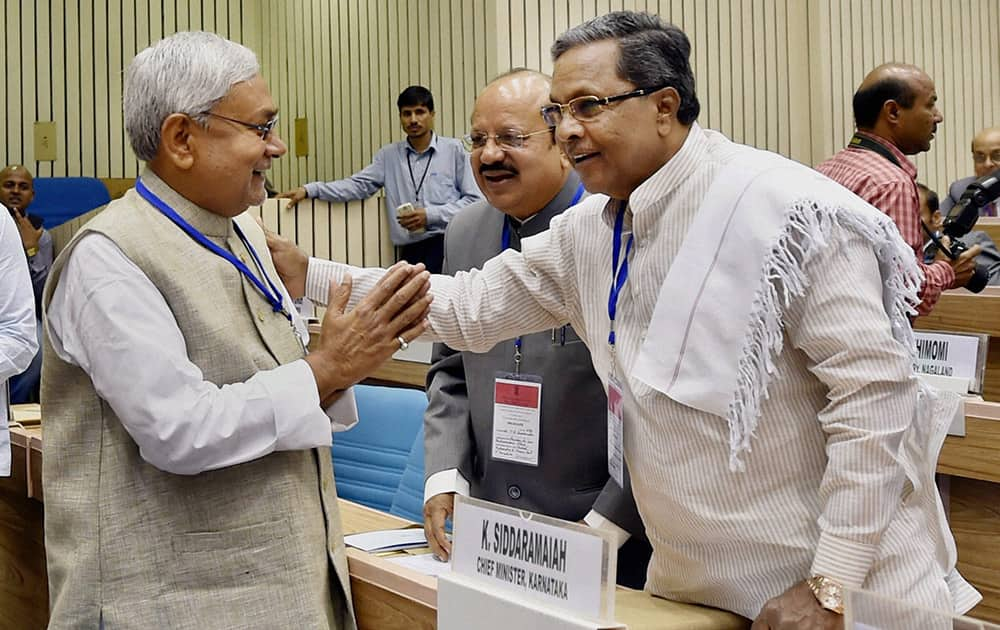 Bihar CM Nitish Kumar with Karnataka CM K Siddaramaiah during the inauguration of the joint conference of the CMs and the CJs of High Courts at Vigyan Bhawan in New Delhi.