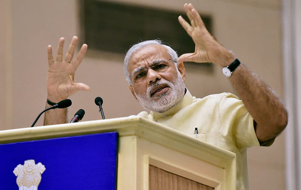 Prime Minister Narendra Modi speaks during the inauguration of the joint conference of the CMs and the CJ of High Courts at Vigyan Bhawan in New Delhi.