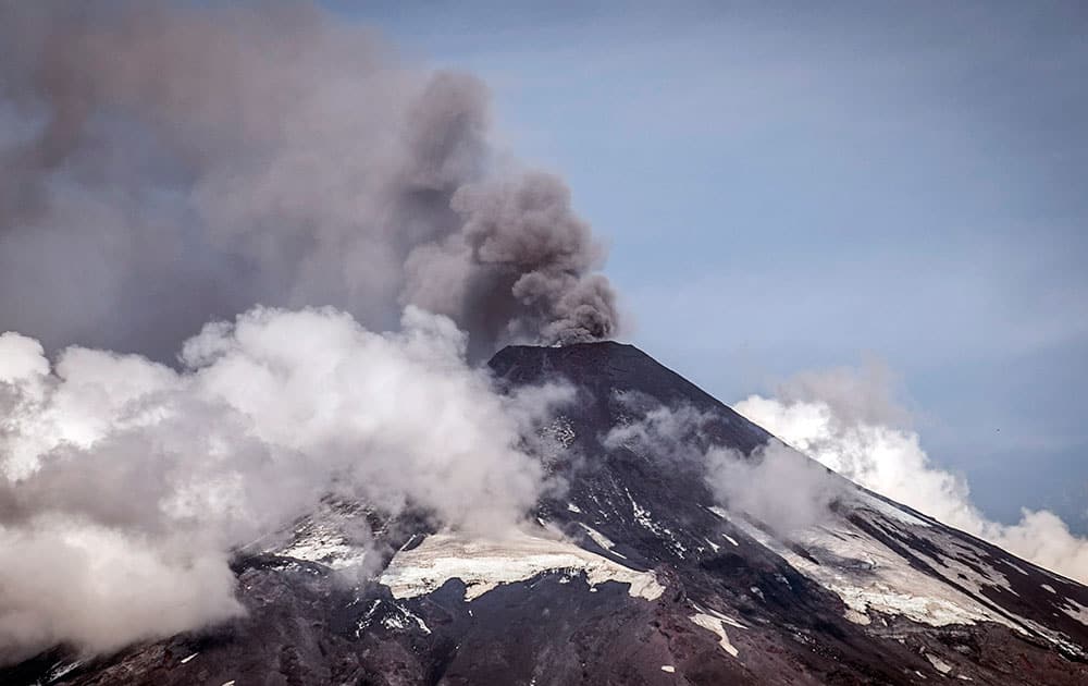 The Villarrica volcano emits a plume of smoke and gases near Pucon, Chile.