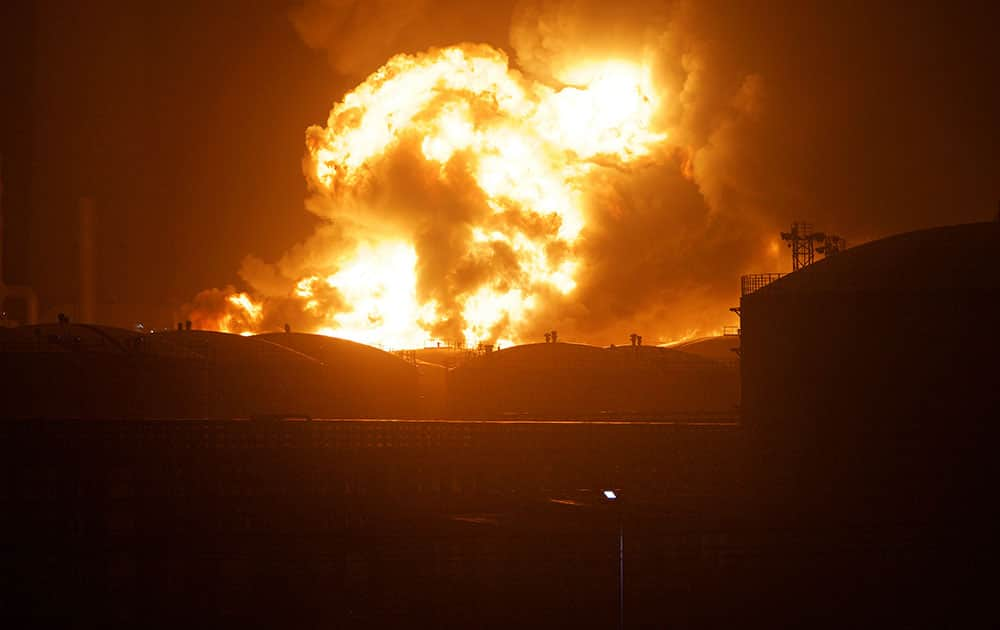 flames rise from a chemical plant in Zhangzhou, southeast China's Fujian Province.