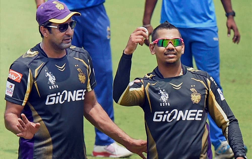 KKR player Sunil Narine and bowling coach Wasim Akram during a practice session at Eden Garden in Kolkata.