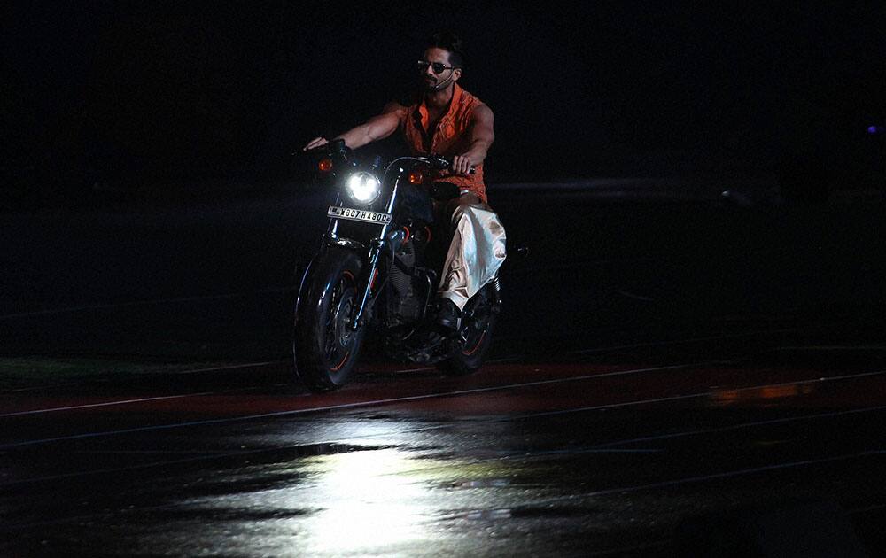 Bollywood Actor Shahid Kapoor performs during the Pepsi IPL 2015 opening night event at the Salt Lake Stadium in Kolkata.