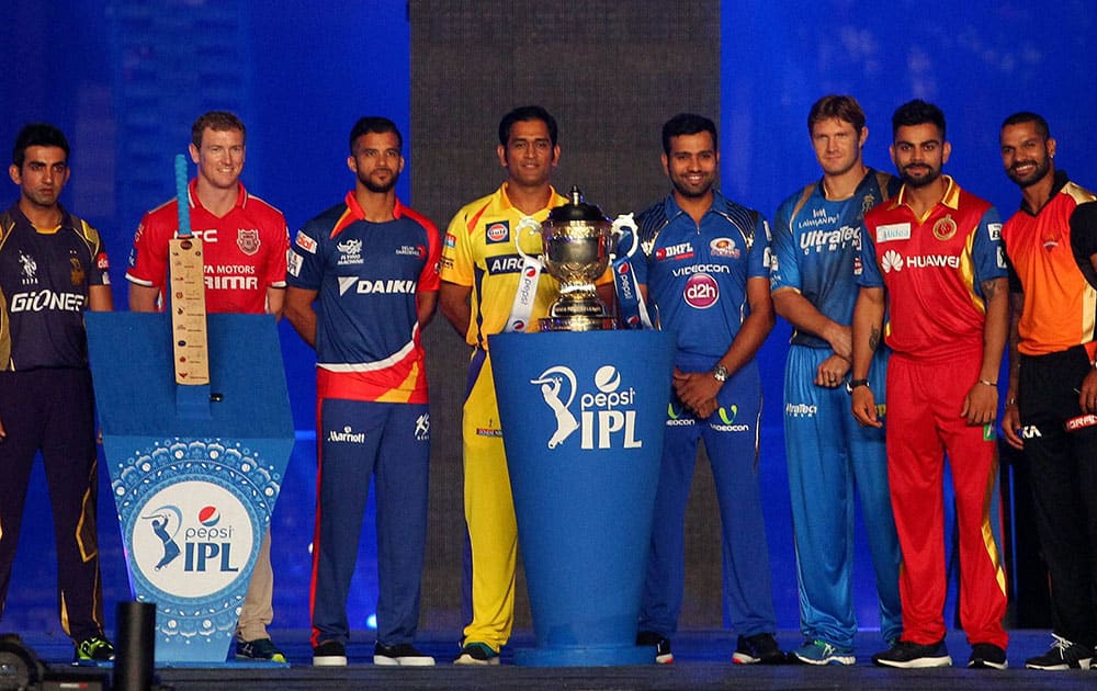 Captain from all IPL team with IPL Trophy during the Pepsi IPL 2015 opening night event held at the Salt Lake Stadium in Kolkata.