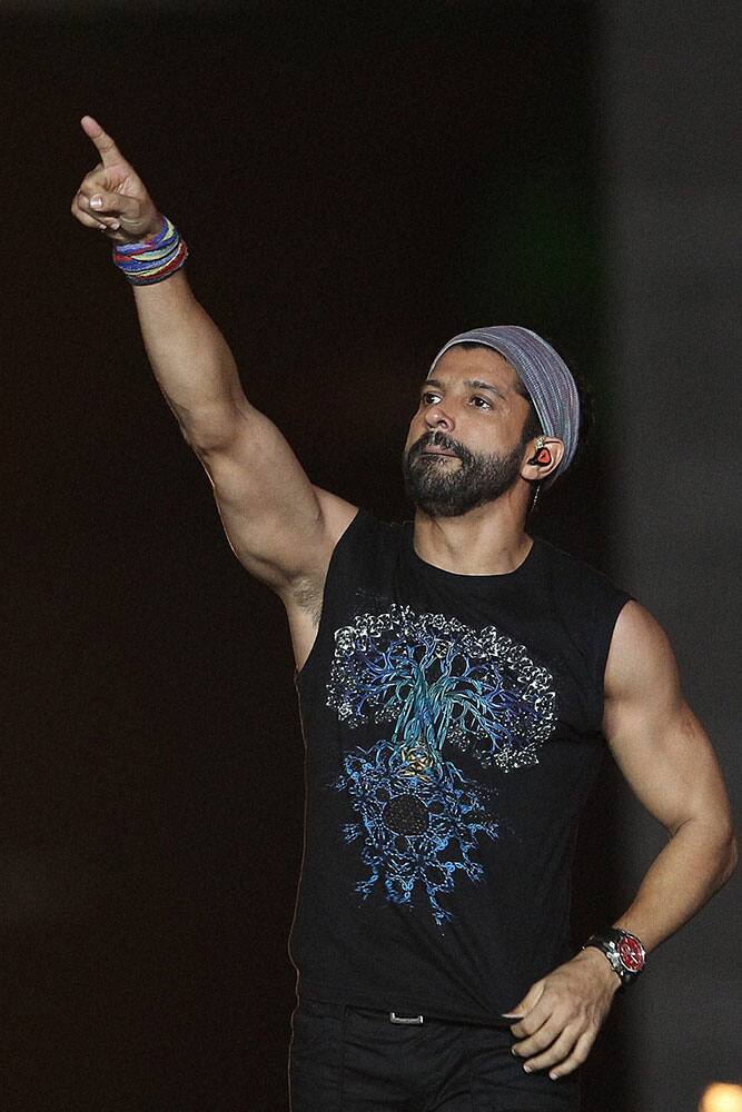 Bollywood Actor Farhan Akhtar performs during the Pepsi IPL 2015 opening night event at the Salt Lake Stadium in Kolkata.