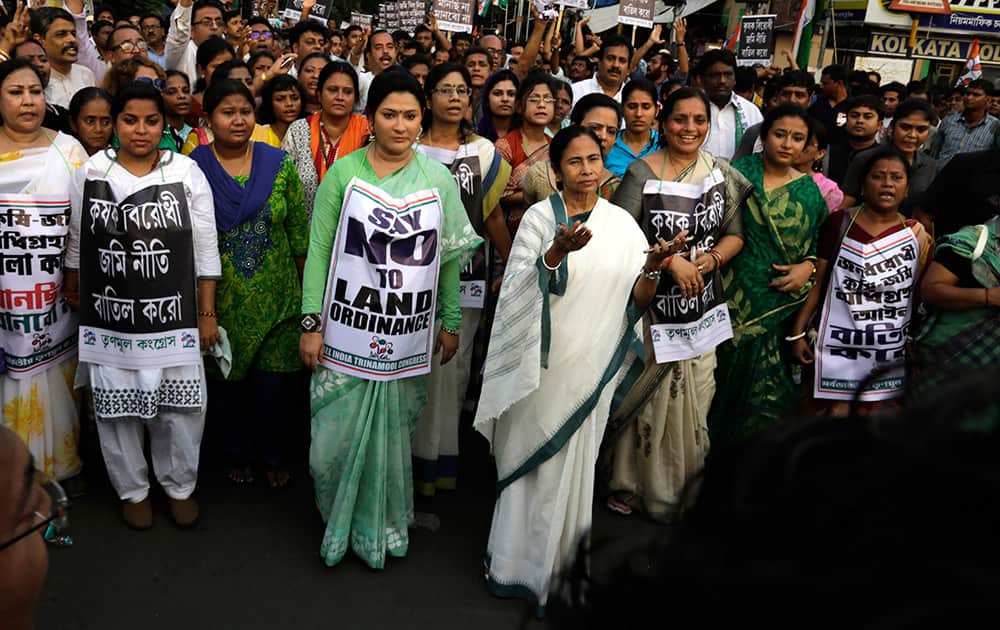 West Bengal Chief Minister Mamata Banerjee, leads a rally, organized by the Trinamul Congress party, against federal government's land acquisition bill in Kolkata.