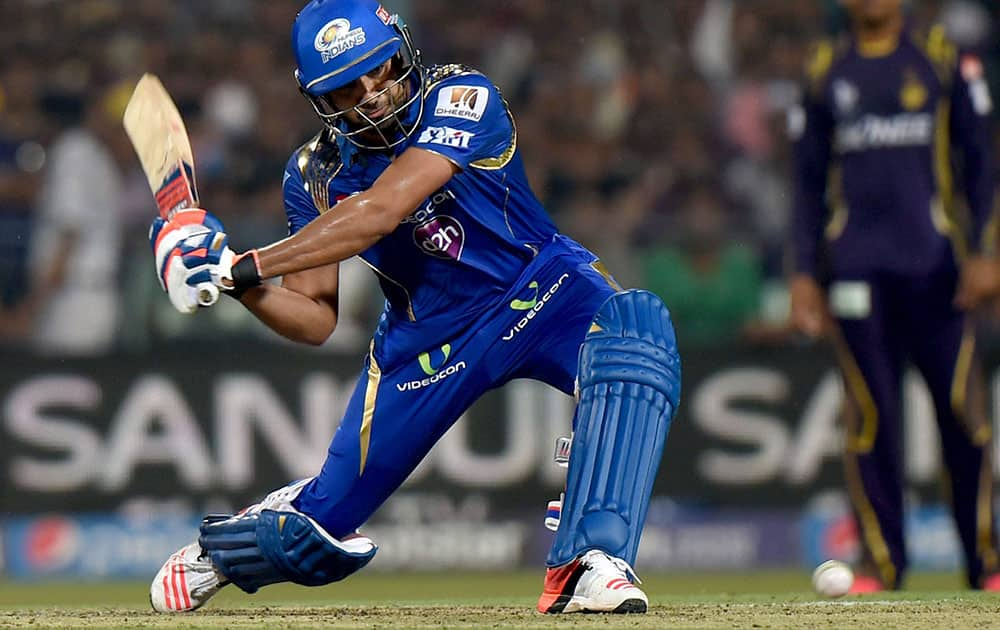 Mumbai Indians batsman Rohit Sharma plays a shot during their IPL-2015 match against KKR at Eden Garden in Kolkata.