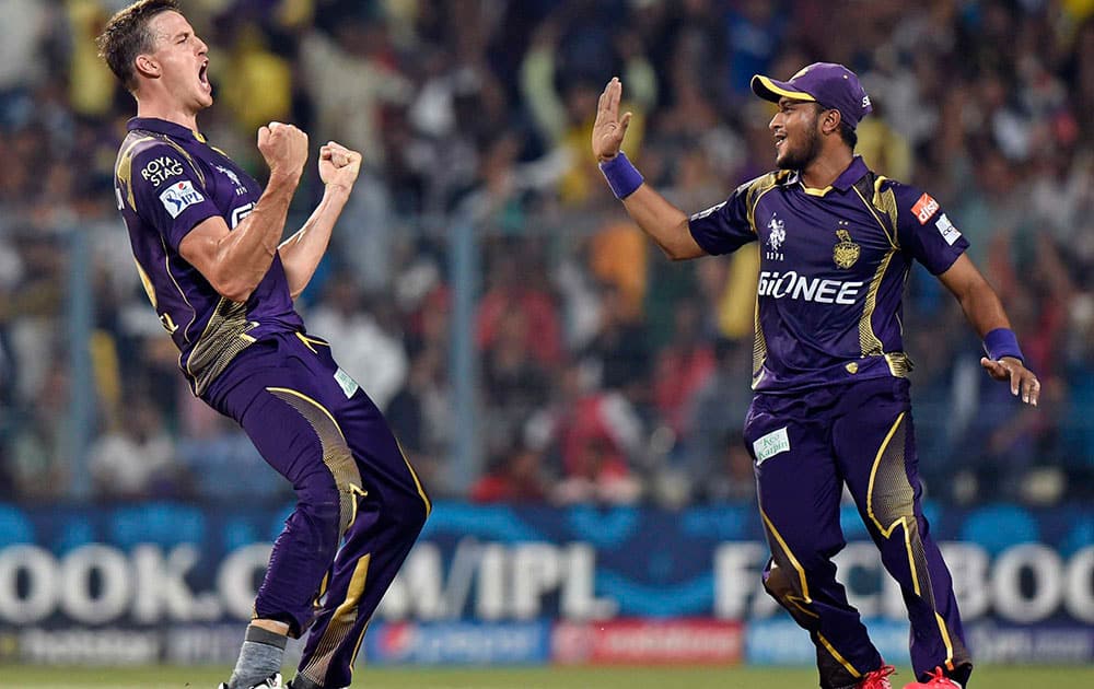 KKR bowler M Morkel celebrates after dismissing a Mumbai Indian batsman during their IPL-2015 match in Kolkata.